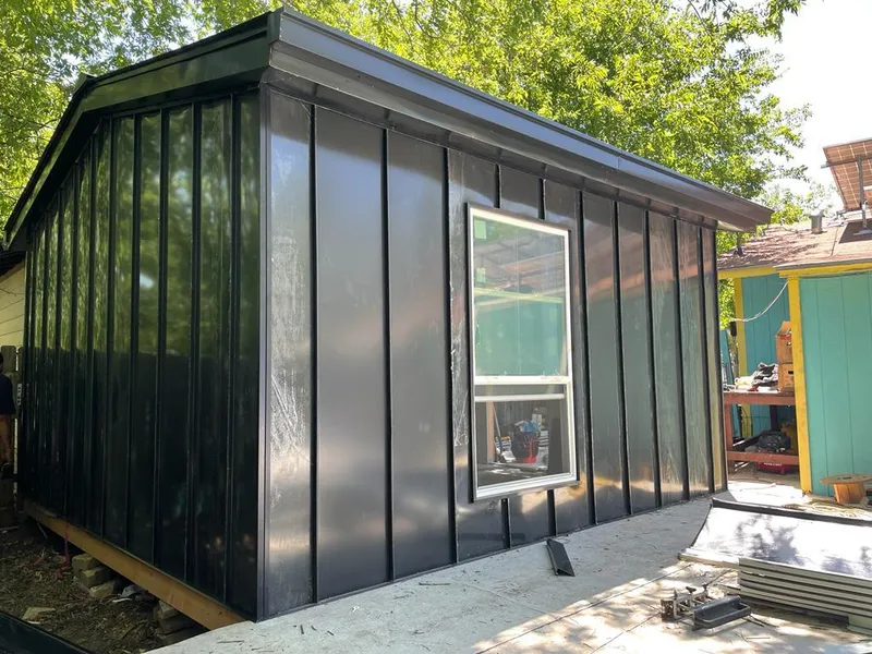 Black standing seam metal wall panels for Metal Roof Installation in Willowick